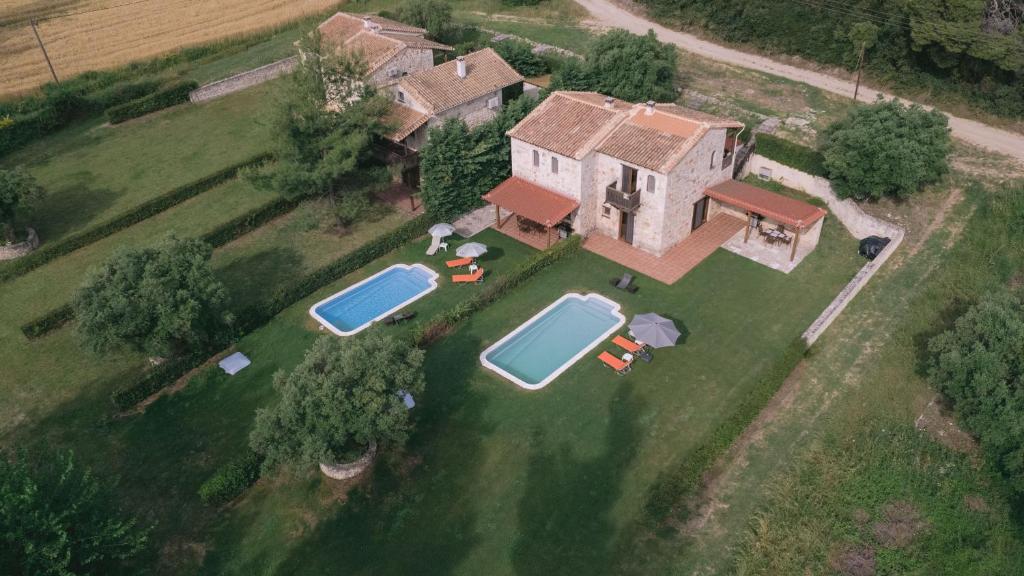 Bazén v ubytování Stone Made Private Pool Villas Kriopigi nebo v jeho okolí