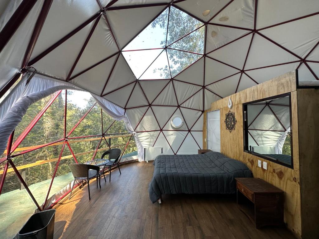 Postel nebo postele na pokoji v ubytování MANDALA CAMP