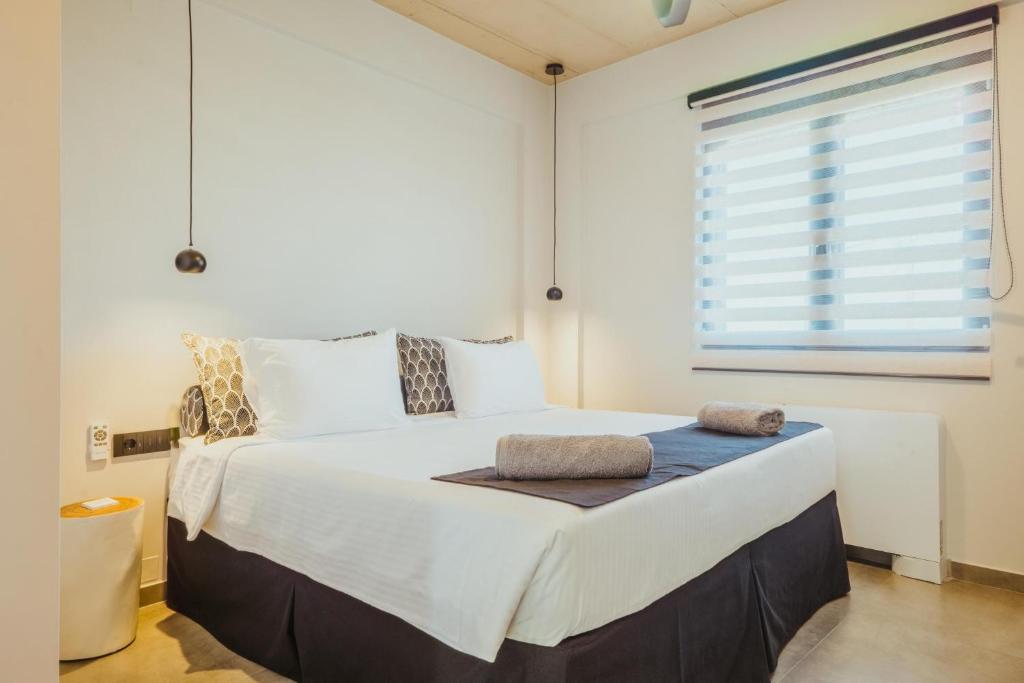 Łóżko lub łóżka w pokoju w obiekcie Anemmaro Villa 3 in Crete