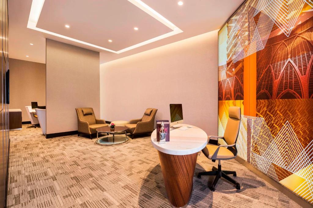 Posezení v ubytování Le Meridien Putrajaya