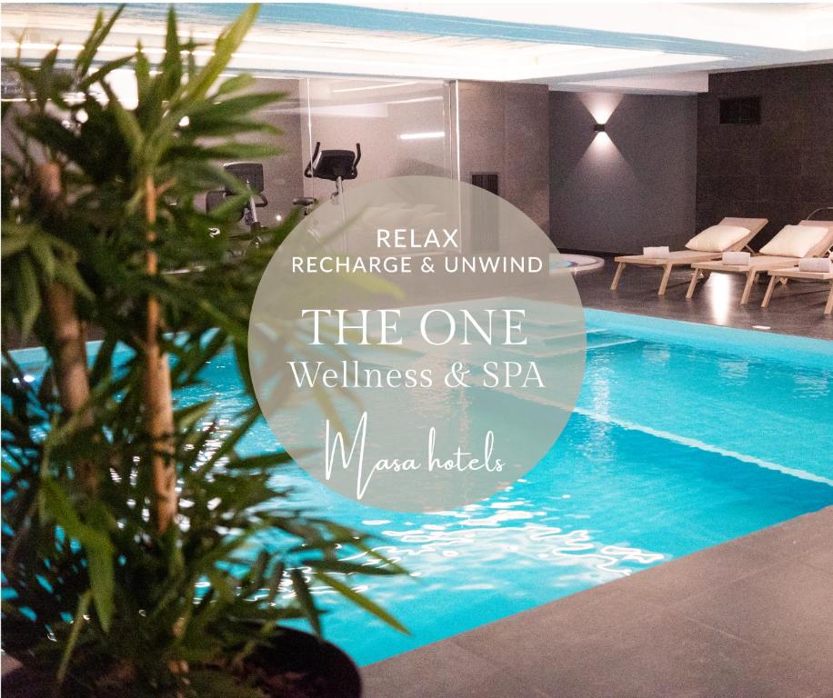 a sign that says the one wellness and spa massage hotel at MASA Hotel & Spa Campo Grande Collection in Lisbon