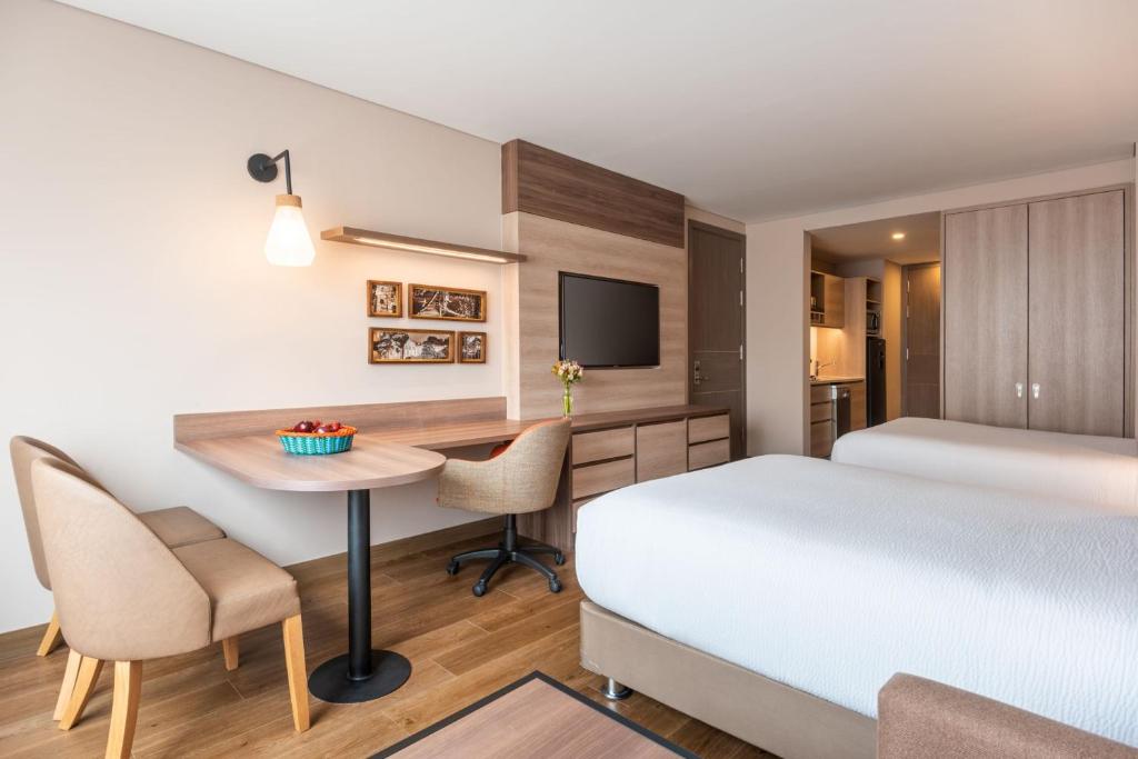 Postel nebo postele na pokoji v ubytování Residence Inn by Marriott Bogota