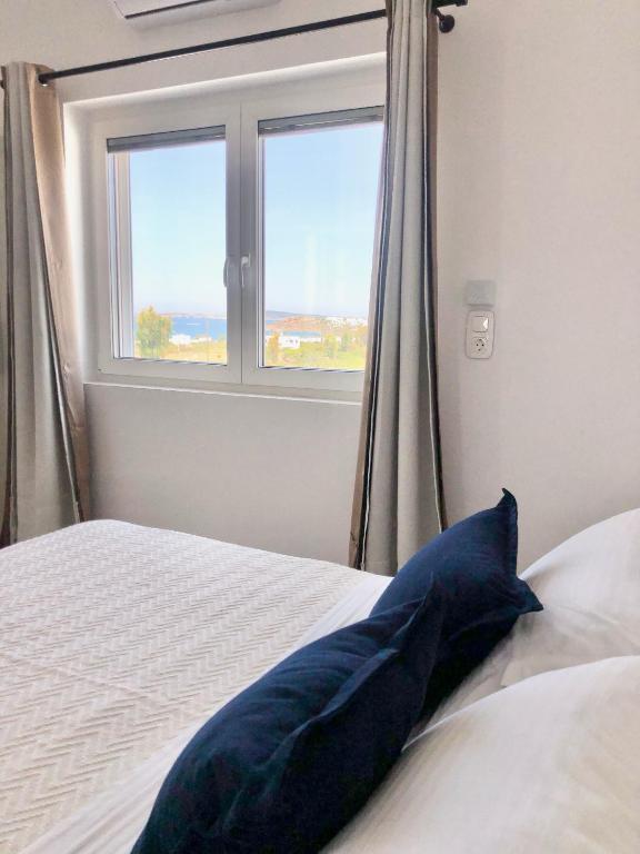 Postel nebo postele na pokoji v ubytování Agrabeli Paros