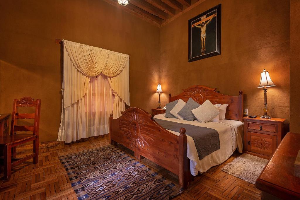 Postel nebo postele na pokoji v ubytování Hotel Casa del Refugio