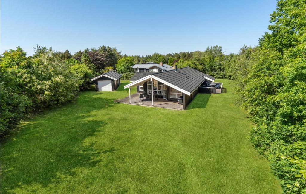 an aerial view of a home with a large yard at Gorgeous Home In Hals With Sauna in Hals
