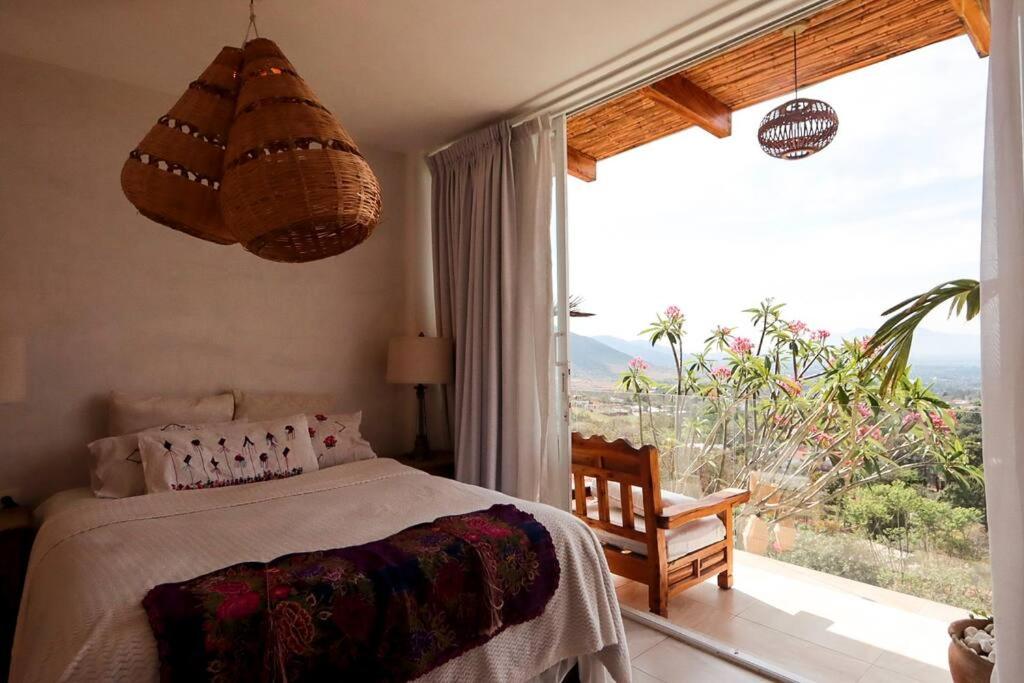 Posteľ alebo postele v izbe v ubytovaní CASA SIRENA Montaña, Alberca y Hermosa vista