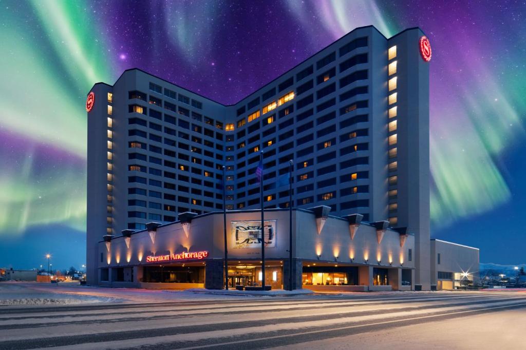 a hotel with the aurora in the sky at Sheraton Anchorage Hotel in Anchorage