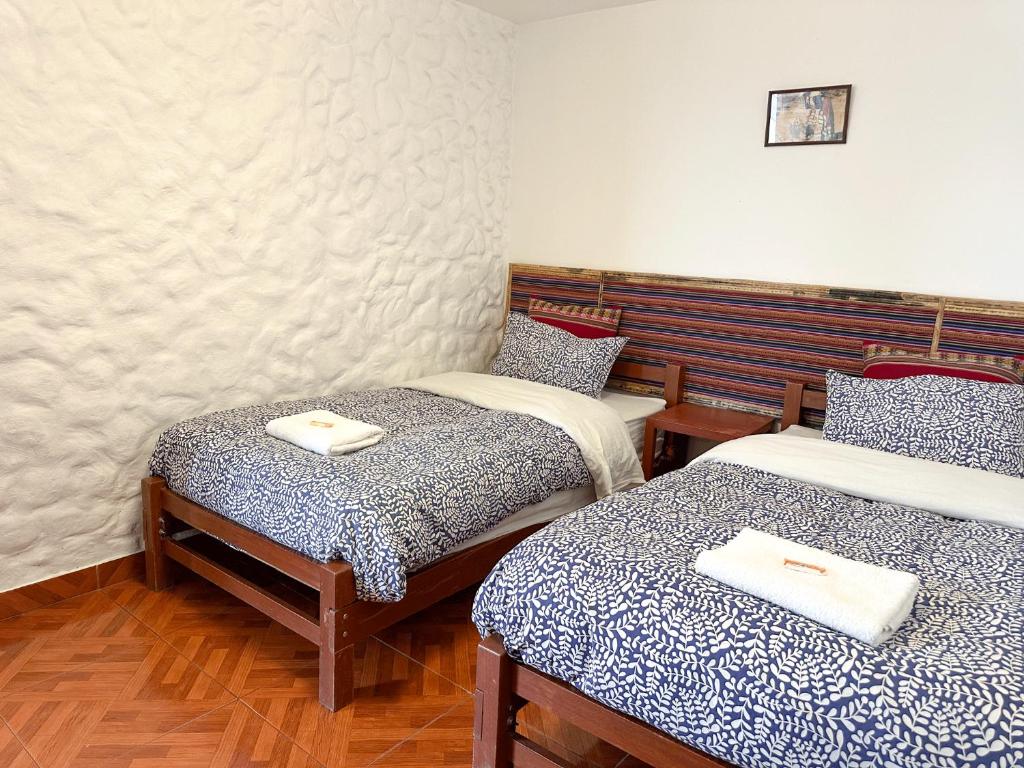 Postel nebo postele na pokoji v ubytování Homestay Pachamama