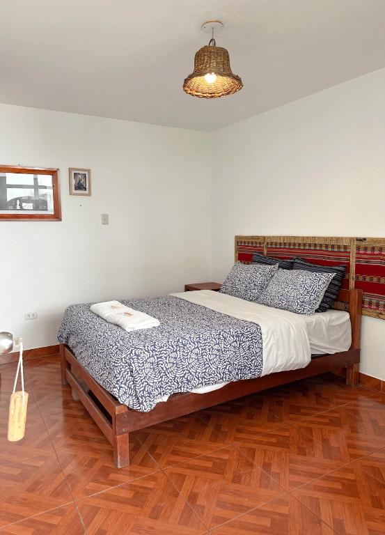 Postel nebo postele na pokoji v ubytování Homestay Pachamama
