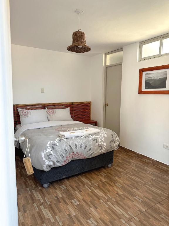Postel nebo postele na pokoji v ubytování Homestay Pachamama