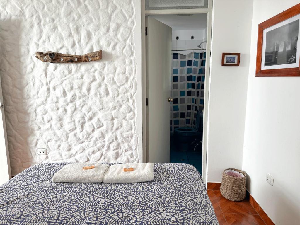 Postel nebo postele na pokoji v ubytování Homestay Pachamama