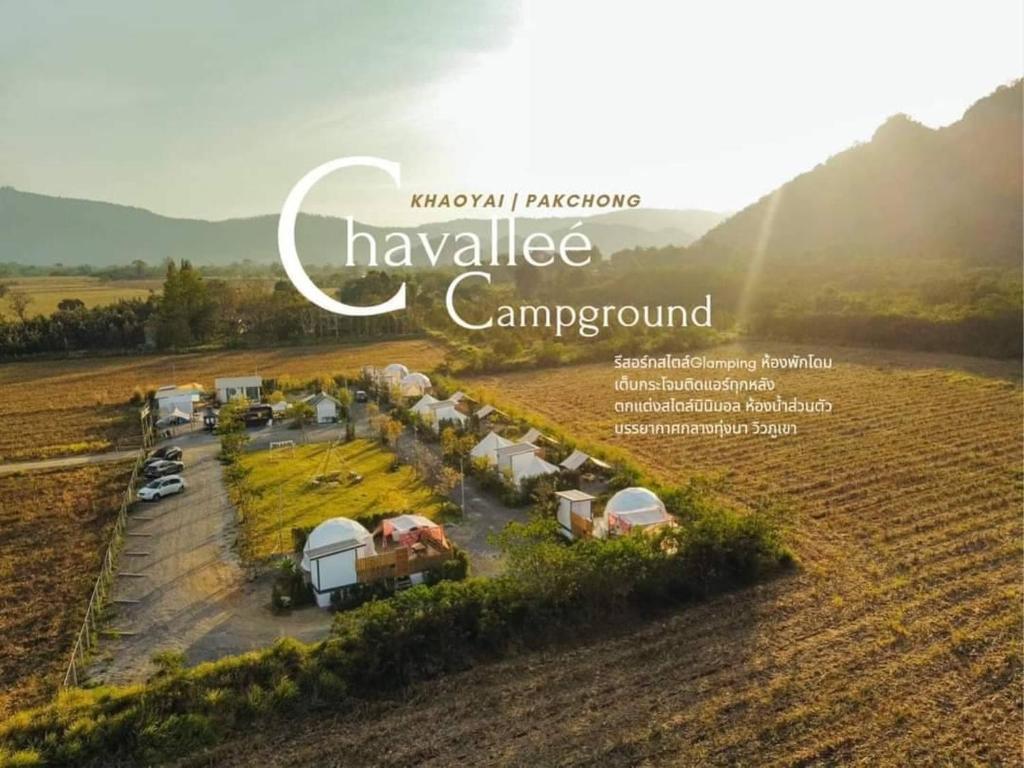 an aerial view of a campground in a field at Chavallee Campground in Ban Tha Chang