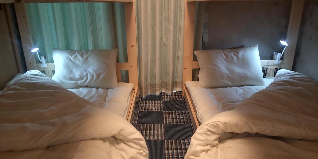 Postel nebo postele na pokoji v ubytování Guest Room安曇野2466