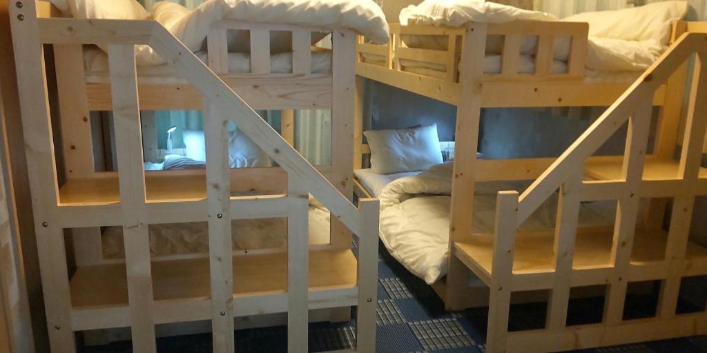 Postel nebo postele na pokoji v ubytování Guest Room安曇野2466