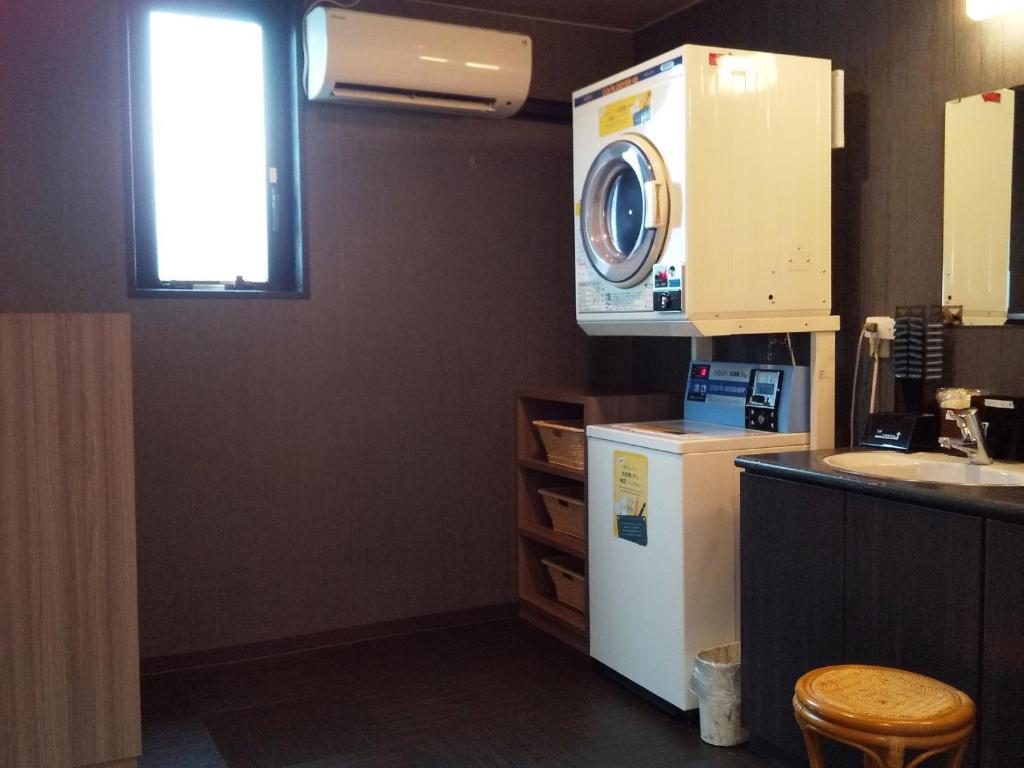 Kuchyň nebo kuchyňský kout v ubytování Hotel Route-Inn Tsu Ekiminami -Kokudo23gou-