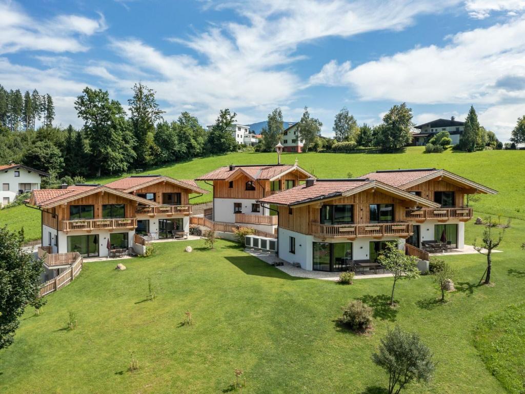 an aerial view of a house on a hill at Chalet in Mariastein Hohe Salve with mountain view in Mariastein