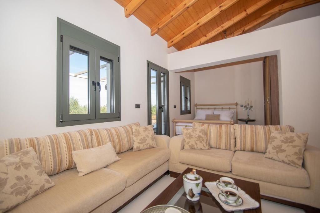 Posezení v ubytování Ariadni Vista Mare Villa by "elite"