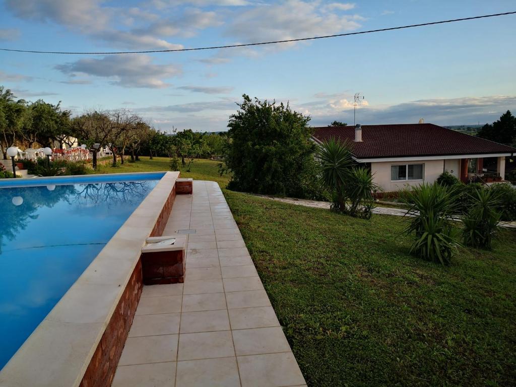 Bazén v ubytování B&B Villa Lena nebo v jeho okolí