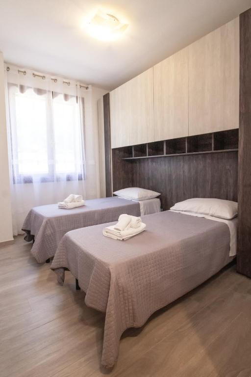 Postel nebo postele na pokoji v ubytování DD HOUSE Family Holiday Apartment