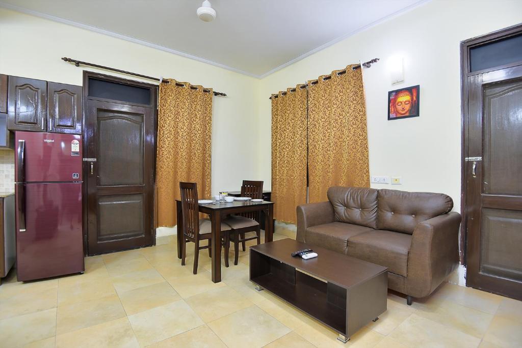 Posezení v ubytování Studio Serviced Apartments near Fortis Hospital