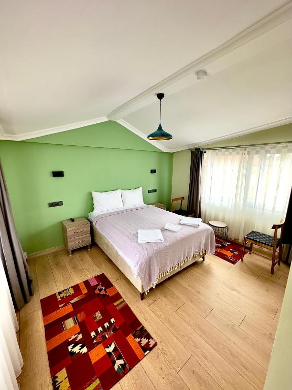 Postel nebo postele na pokoji v ubytování Terrace Guesthouse