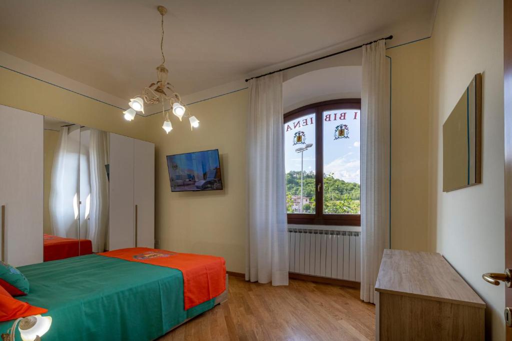 Postel nebo postele na pokoji v ubytování IBibiena - CASA CAMALDOLI