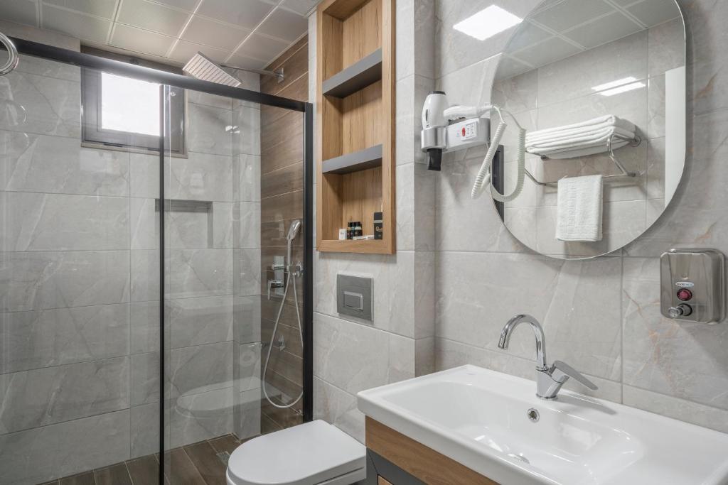 Koupelna v ubytování Quality Gold Suite Hotel