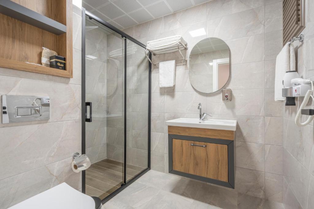 Koupelna v ubytování Quality Gold Suite Hotel