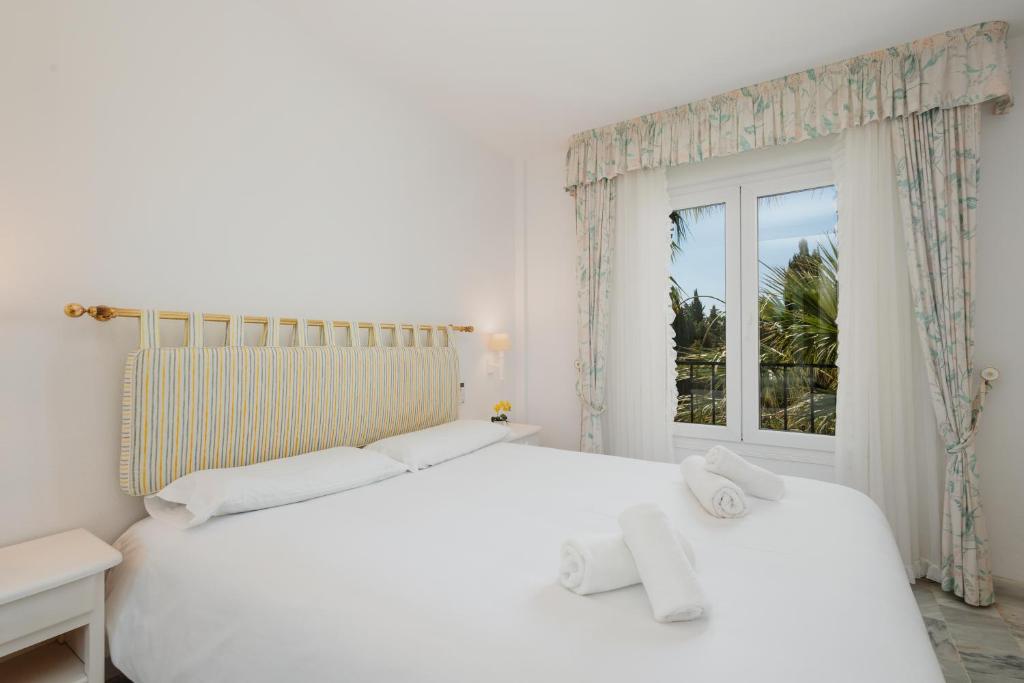 Posteľ alebo postele v izbe v ubytovaní Apartment, close to the beach and sea views, in Marbella