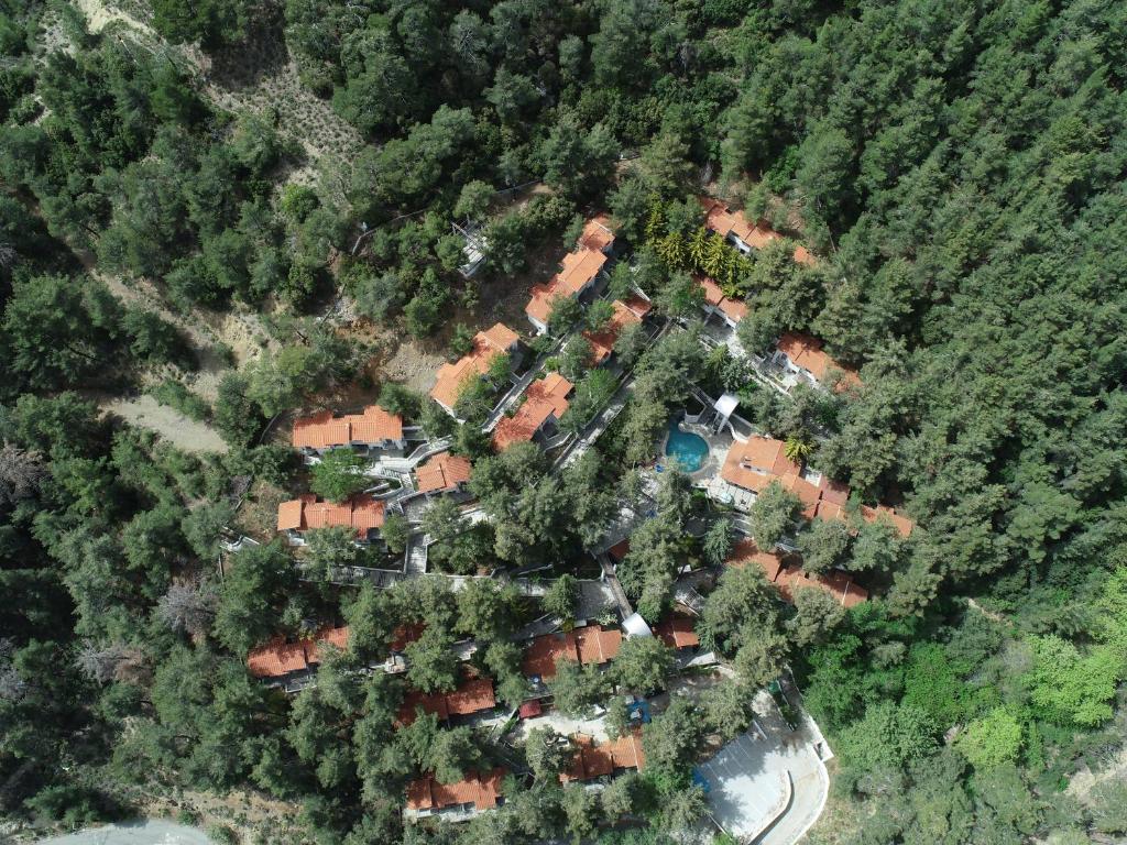 an aerial view of a house in the woods at POED Residences in Platres