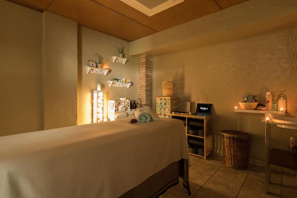 Postel nebo postele na pokoji v ubytování Hotel Anabel