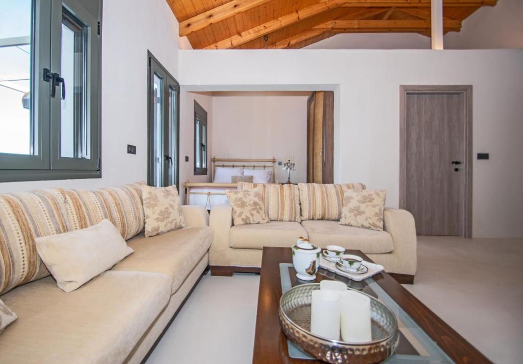 Posezení v ubytování Ariadni Vista Mare Villa by "elite"
