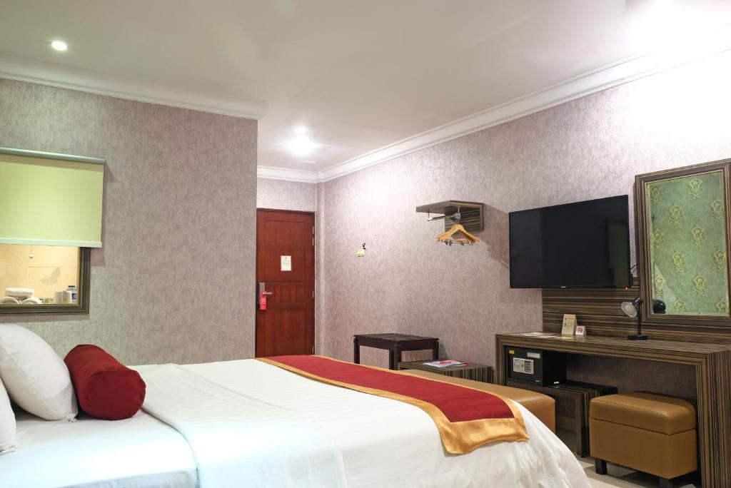 TV a/nebo společenská místnost v ubytování BI Executive Hotel