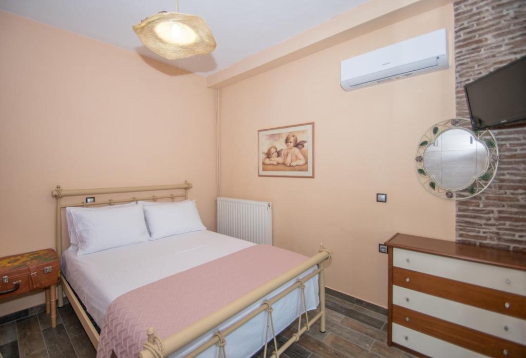 Postel nebo postele na pokoji v ubytování Ariadni Vista Mare Villa by "elite"