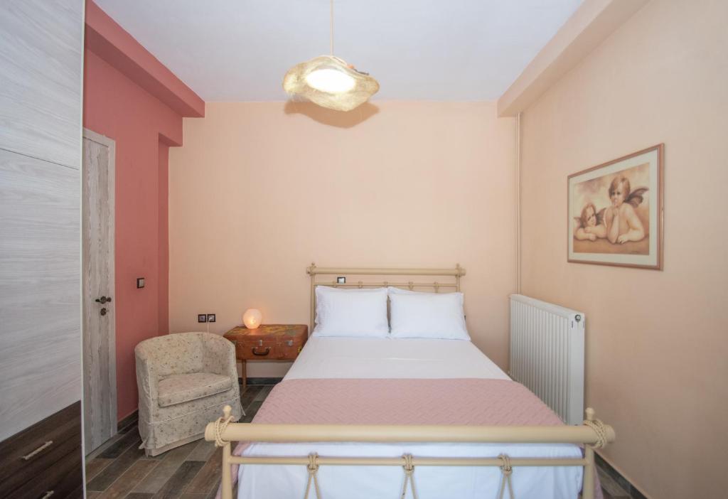Postel nebo postele na pokoji v ubytování Ariadni Vista Mare Villa by "elite"