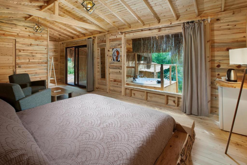 Postel nebo postele na pokoji v ubytování Flavia Hotel