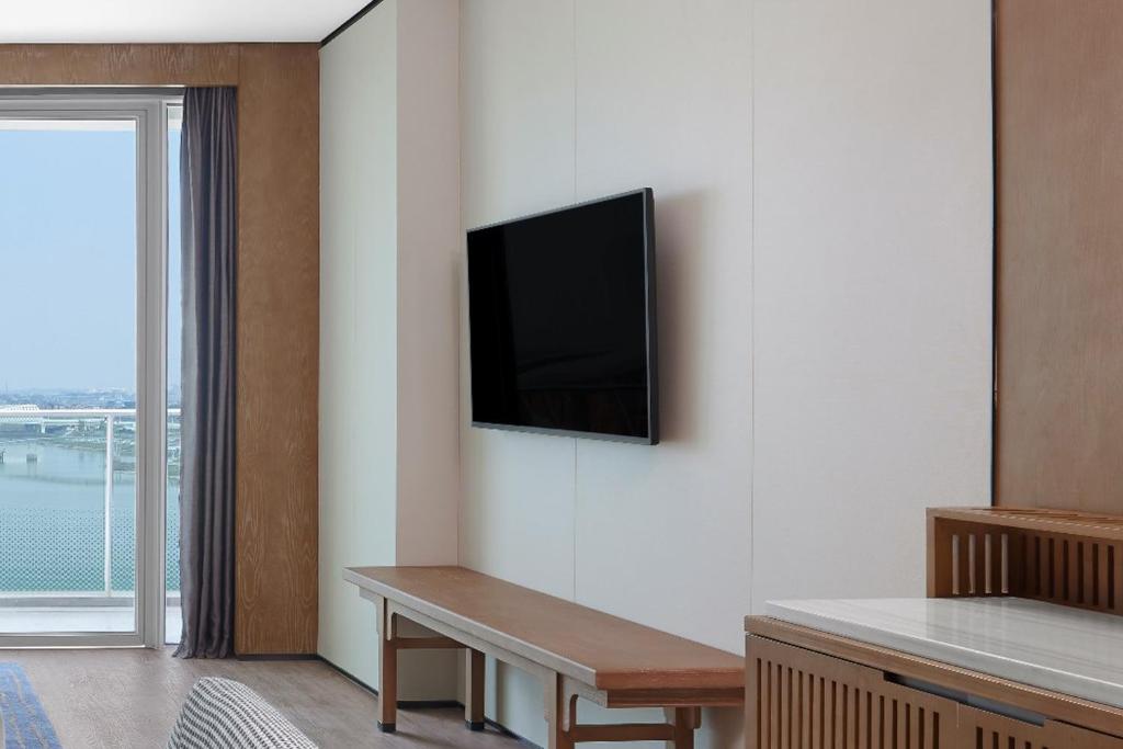 TV a/nebo společenská místnost v ubytování Sheraton Zhaoqing Dinghu
