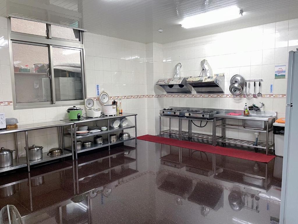 Kuchyň nebo kuchyňský kout v ubytování Chia Yuen Homestay