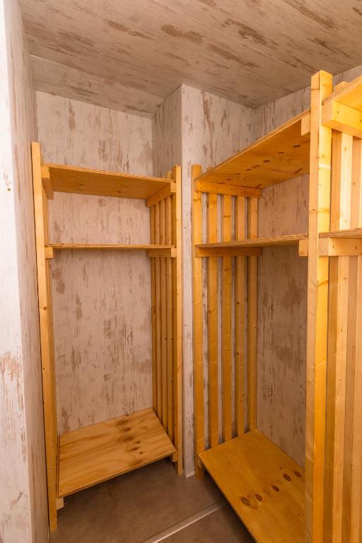 Narivoodi või narivoodid majutusasutuse Le Lenze Don Mimì Glamping toas