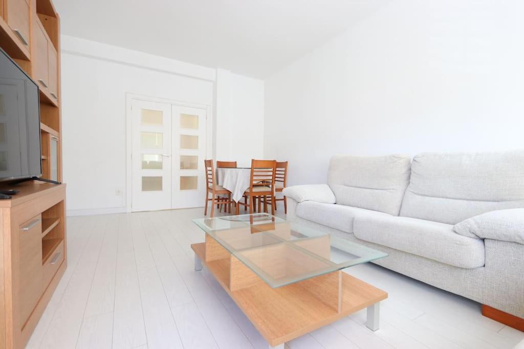 a living room with a couch and a coffee table at Apartamento BELLAS VISTAS in Béjar
