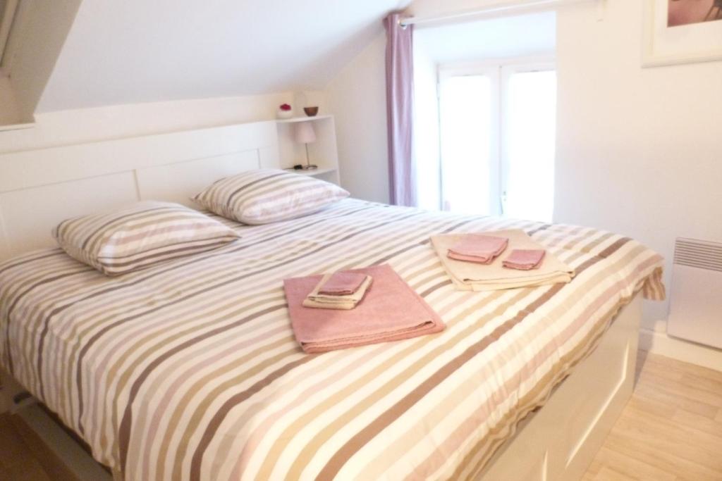 En eller flere senge i et værelse på Halte entre Terre et Mer à Bayeux