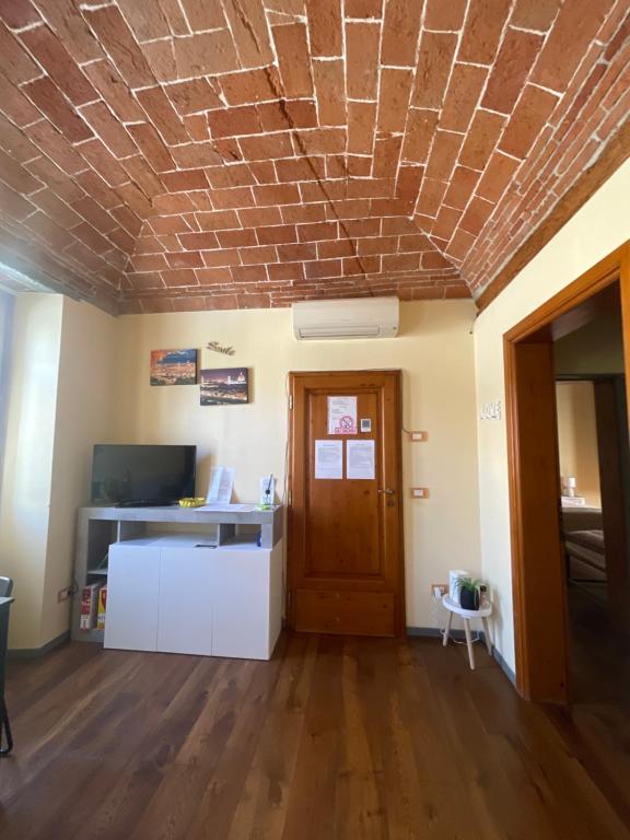 Televízia a/alebo spoločenská miestnosť v ubytovaní relais L’Imperatore