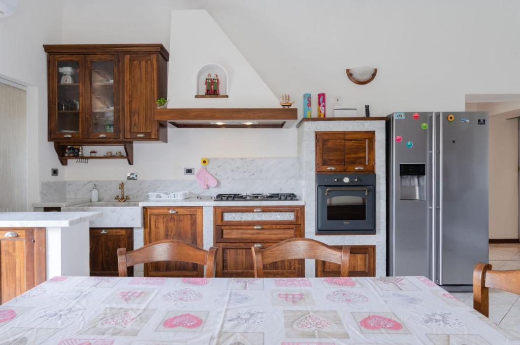 Kuchyň nebo kuchyňský kout v ubytování Casa dei Renai by Rentbeat