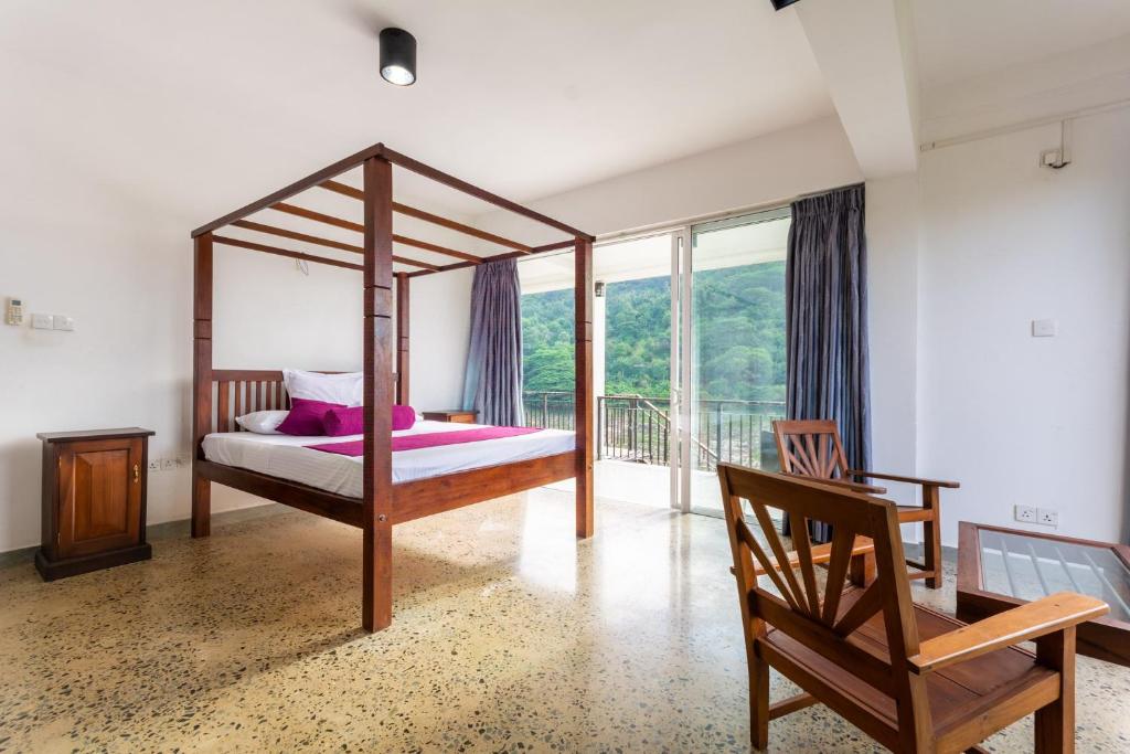 Postel nebo postele na pokoji v ubytování Villa Victoria Edge