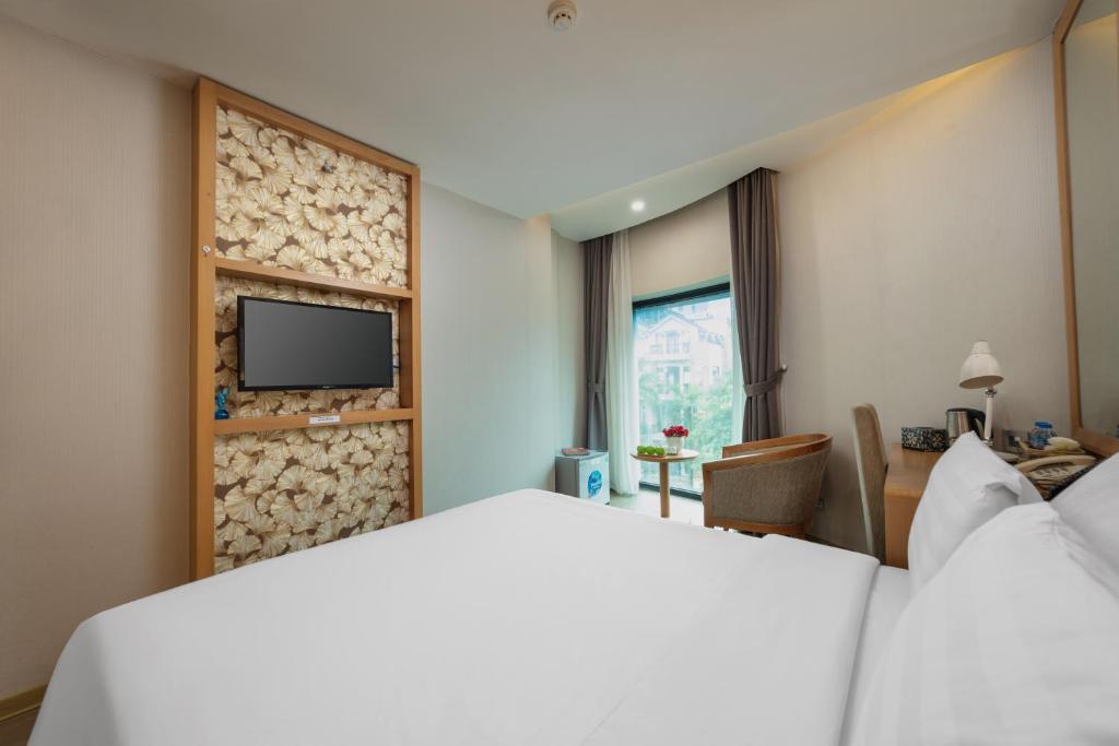 TV a/nebo společenská místnost v ubytování HALO HANOI HOTEL