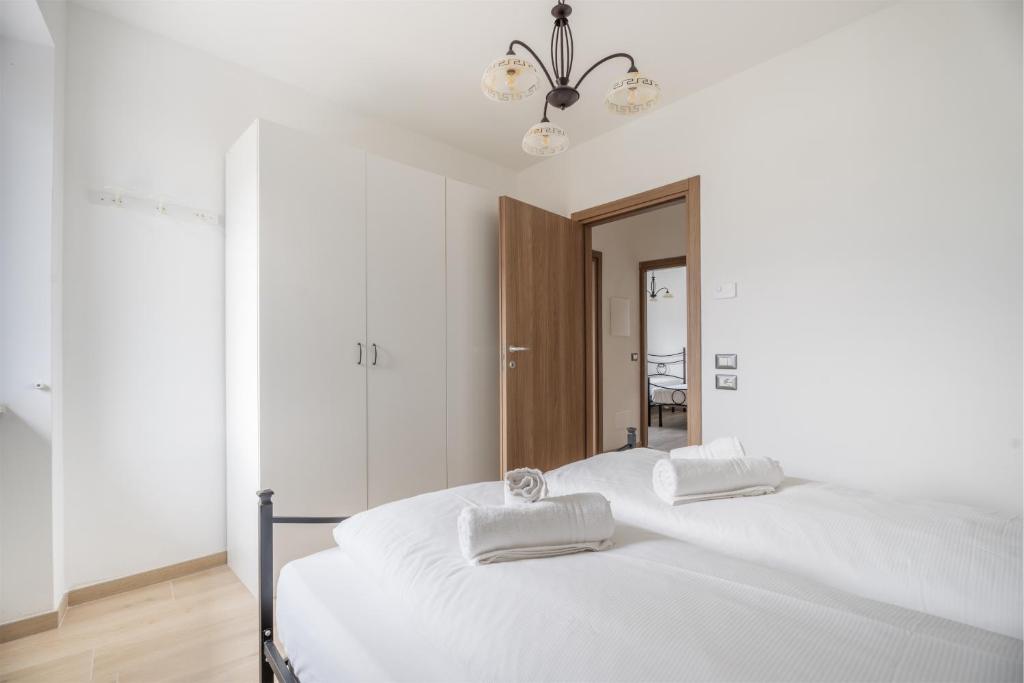 Łóżko lub łóżka w pokoju w obiekcie Casa Stefano