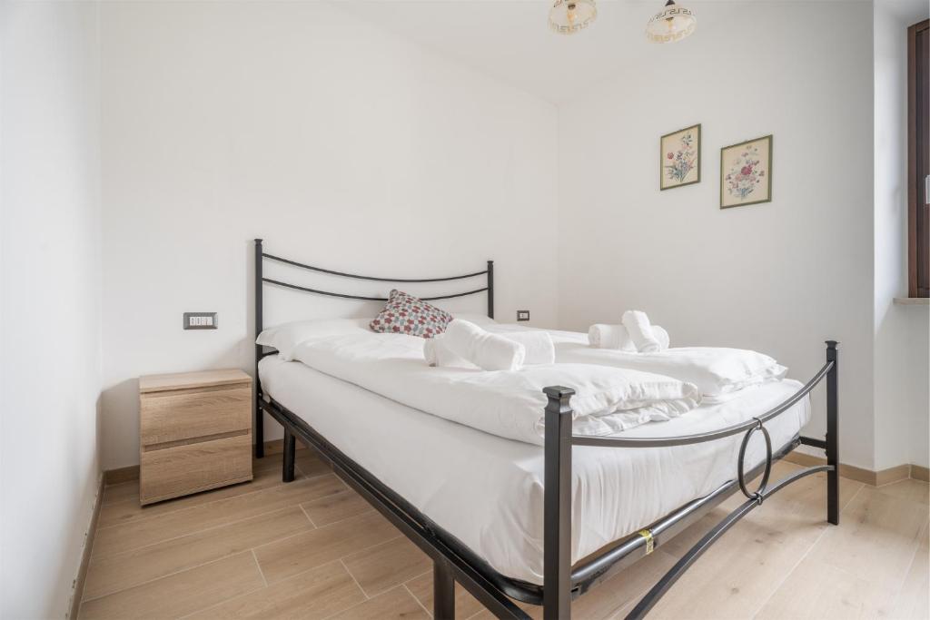 Łóżko lub łóżka w pokoju w obiekcie Casa Stefano
