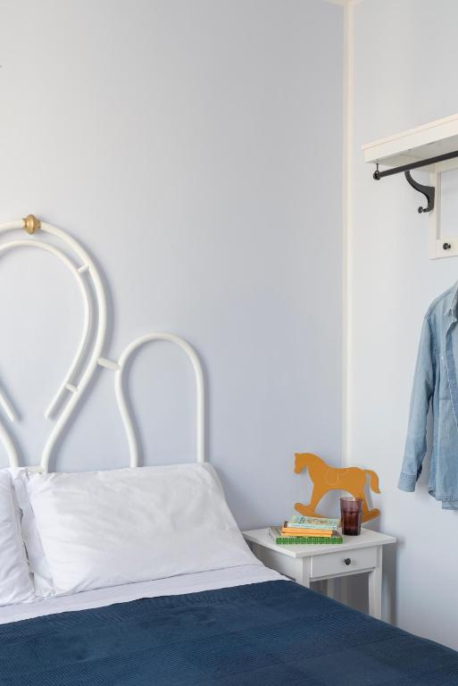 Postel nebo postele na pokoji v ubytování Hotel Posta