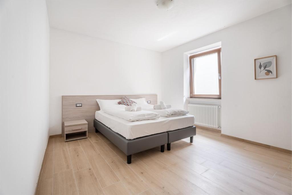 Łóżko lub łóżka w pokoju w obiekcie Casa Stefano