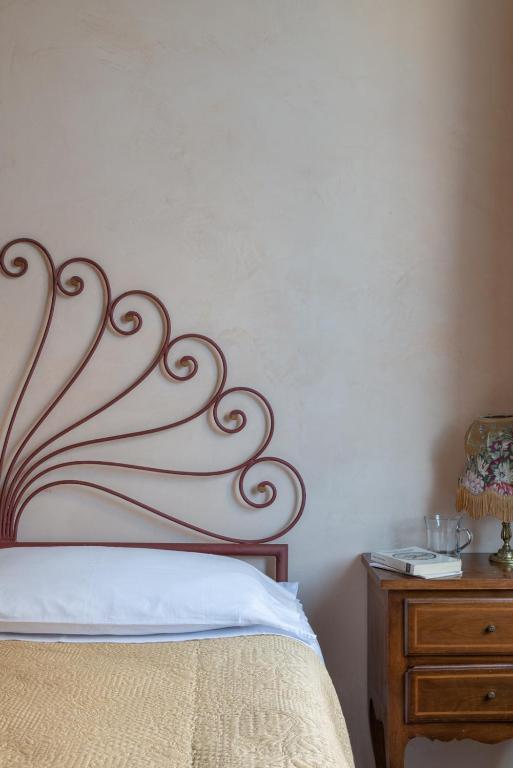 Postel nebo postele na pokoji v ubytování Hotel Posta